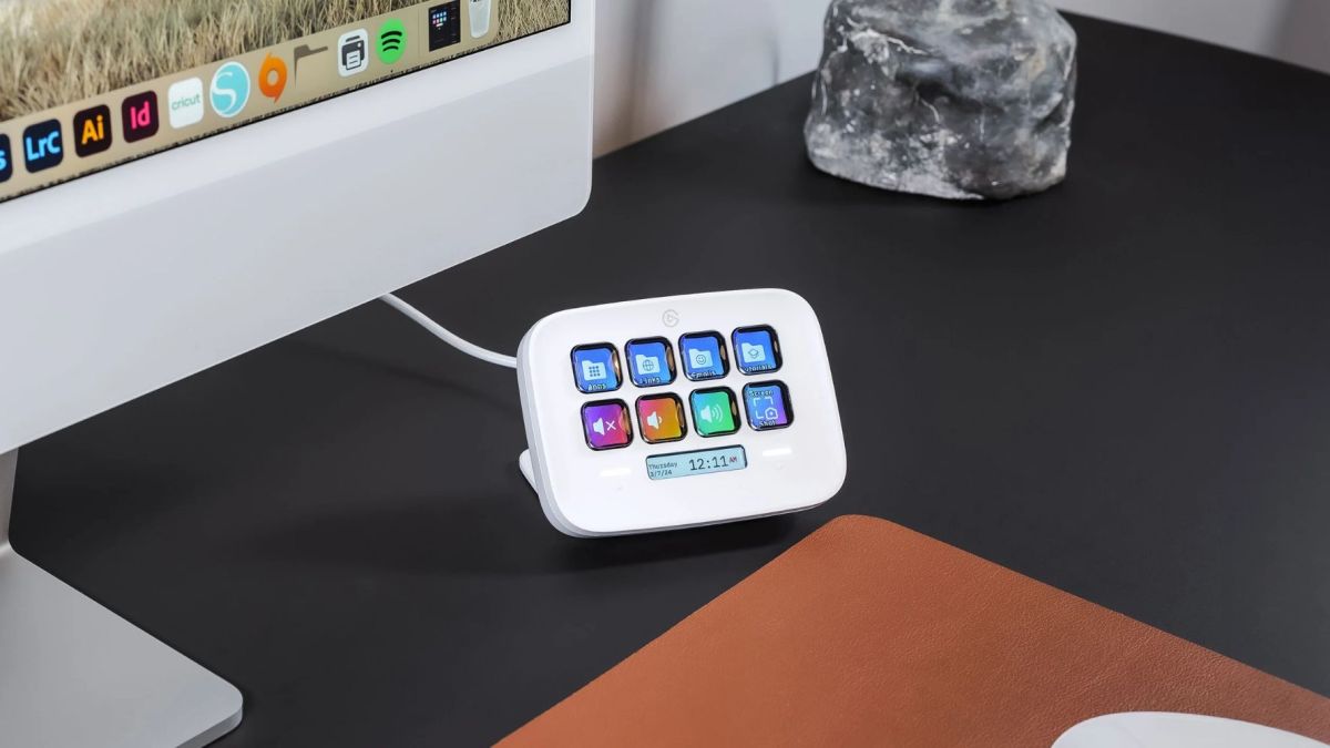 Image showing Elgato's Stream Deck Neo in white next to a Mac.
