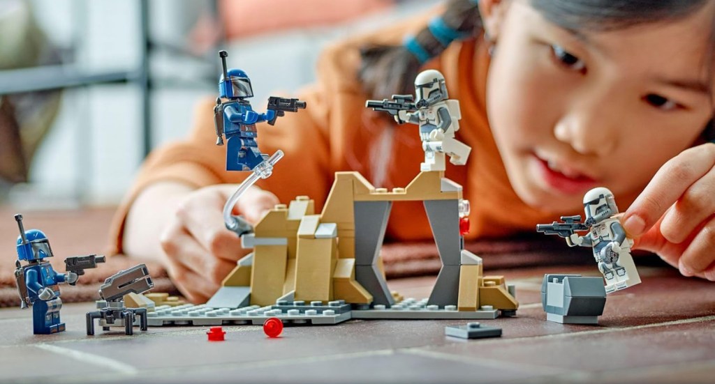 A child playing with lego toys