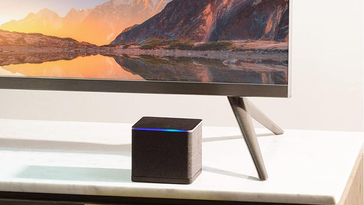 A black square speaker on a white surface