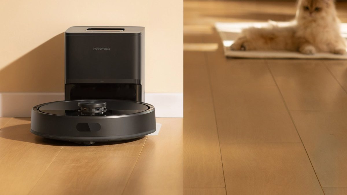 A robot vacuum cleaner on a wood floor